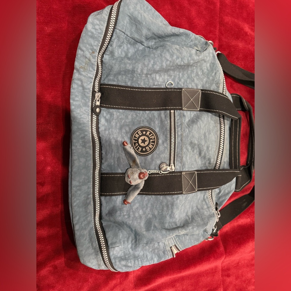 Kipling Light Blue Duffel Bag with Black Accents